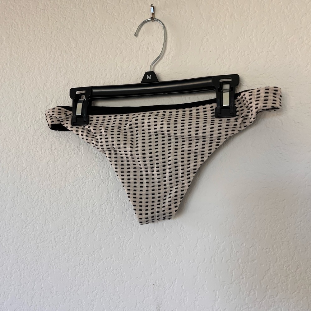 Beach riot
Black and white swim bottoms